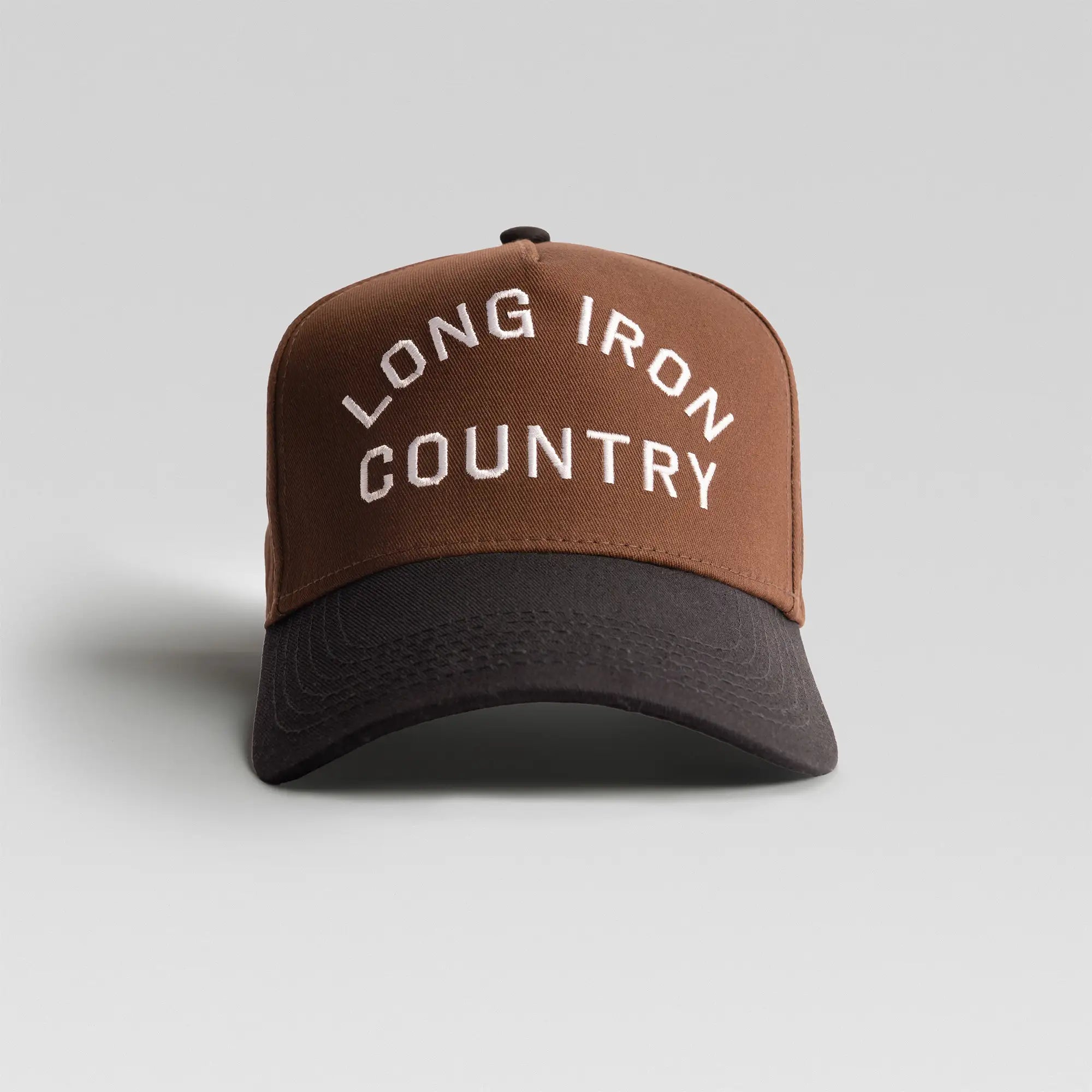 BUNX Golf Long Iron Country 5-panel A-frame snapback in brown with black brim, front view with arched embroidery