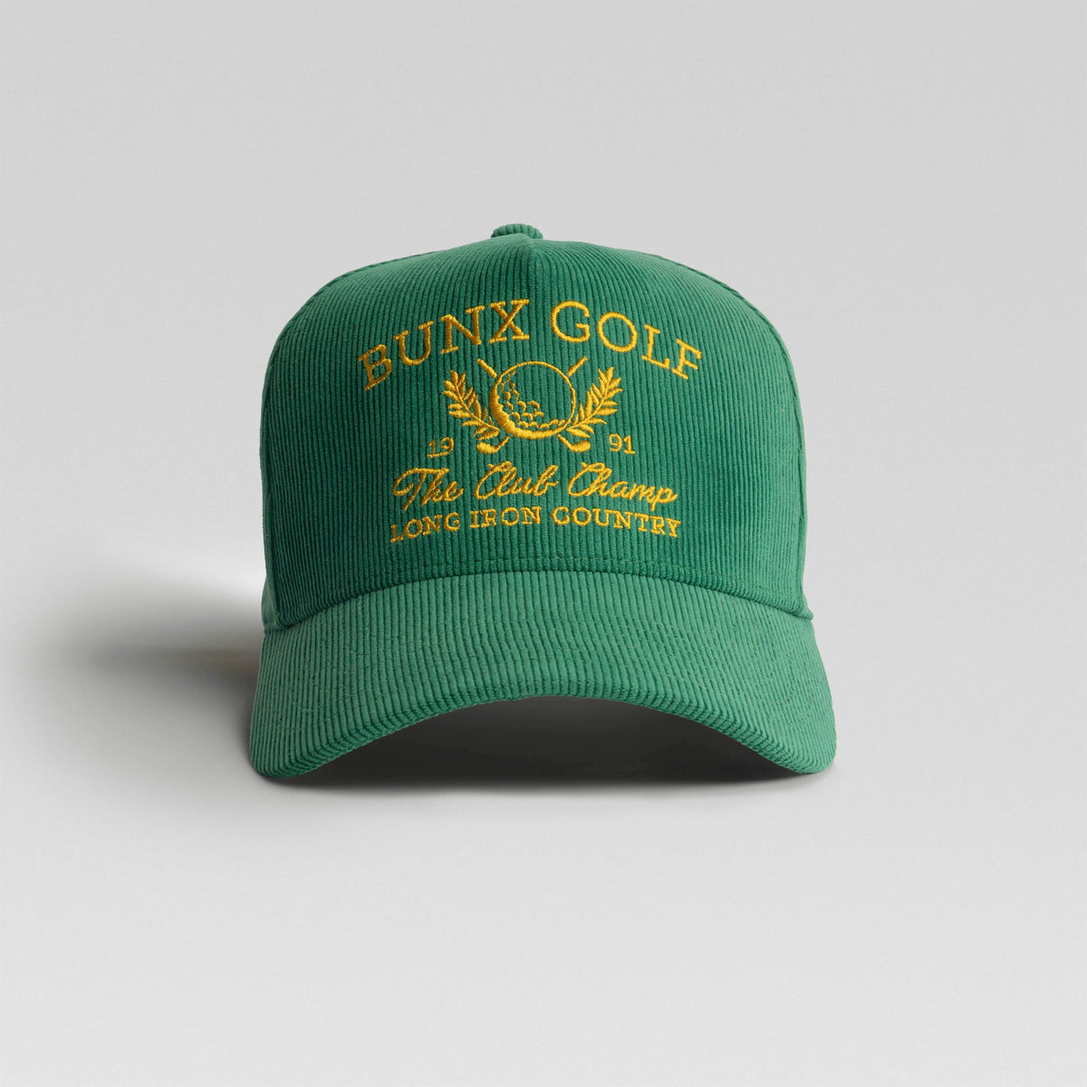 BUNX Golf Club Champ 5-panel snapback in green corduroy with gold embroidery, front view