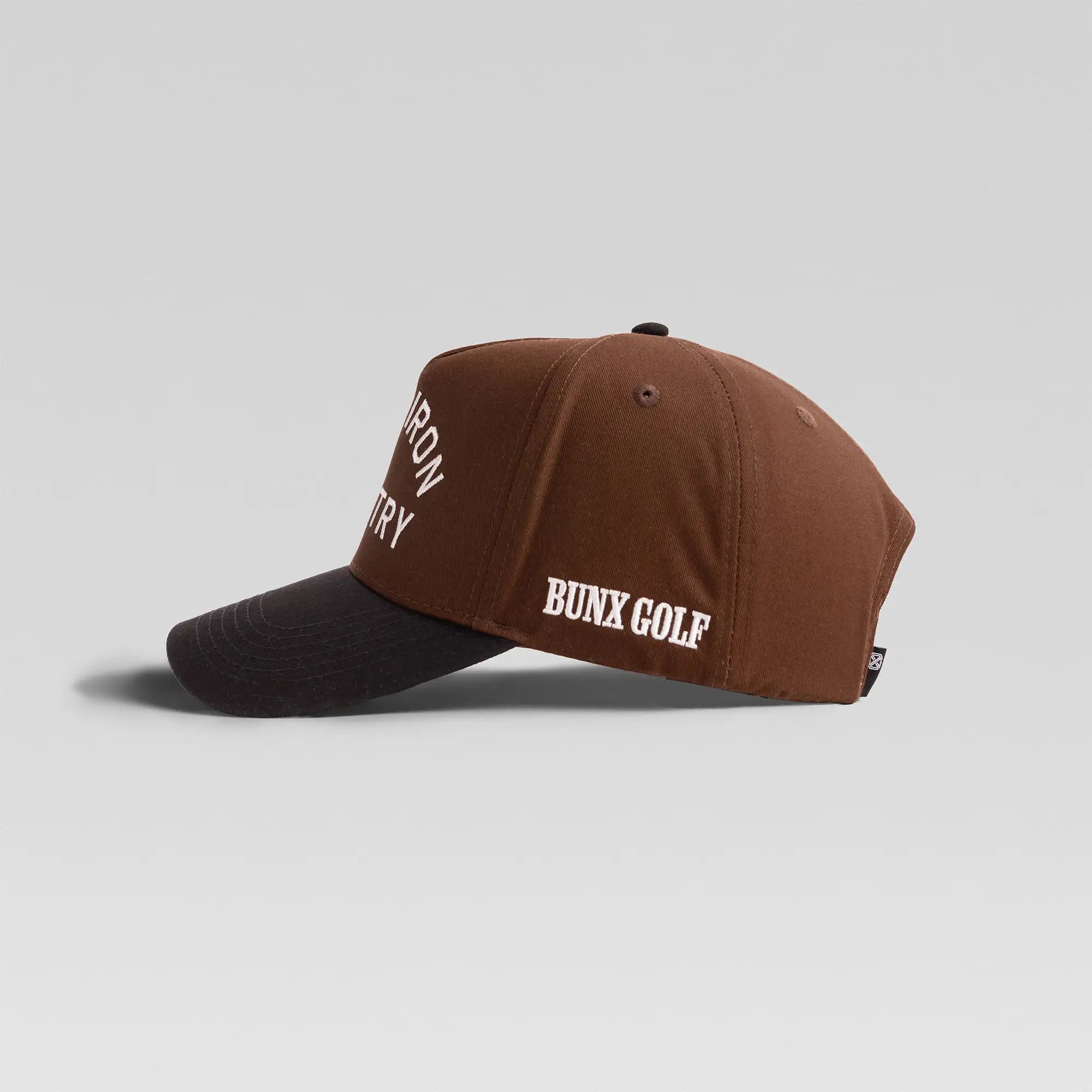 BUNX Golf Long Iron Country brown and black snapback, left side view with BUNX Golf embroidery