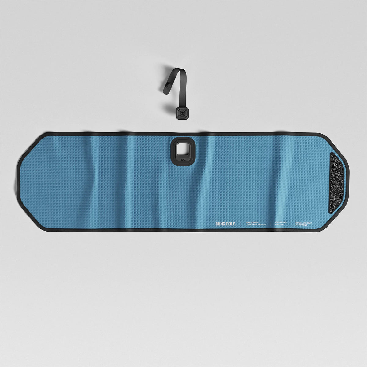 BUNX Golf magnetic towel in steel blue with technical typography and Fidlock strap